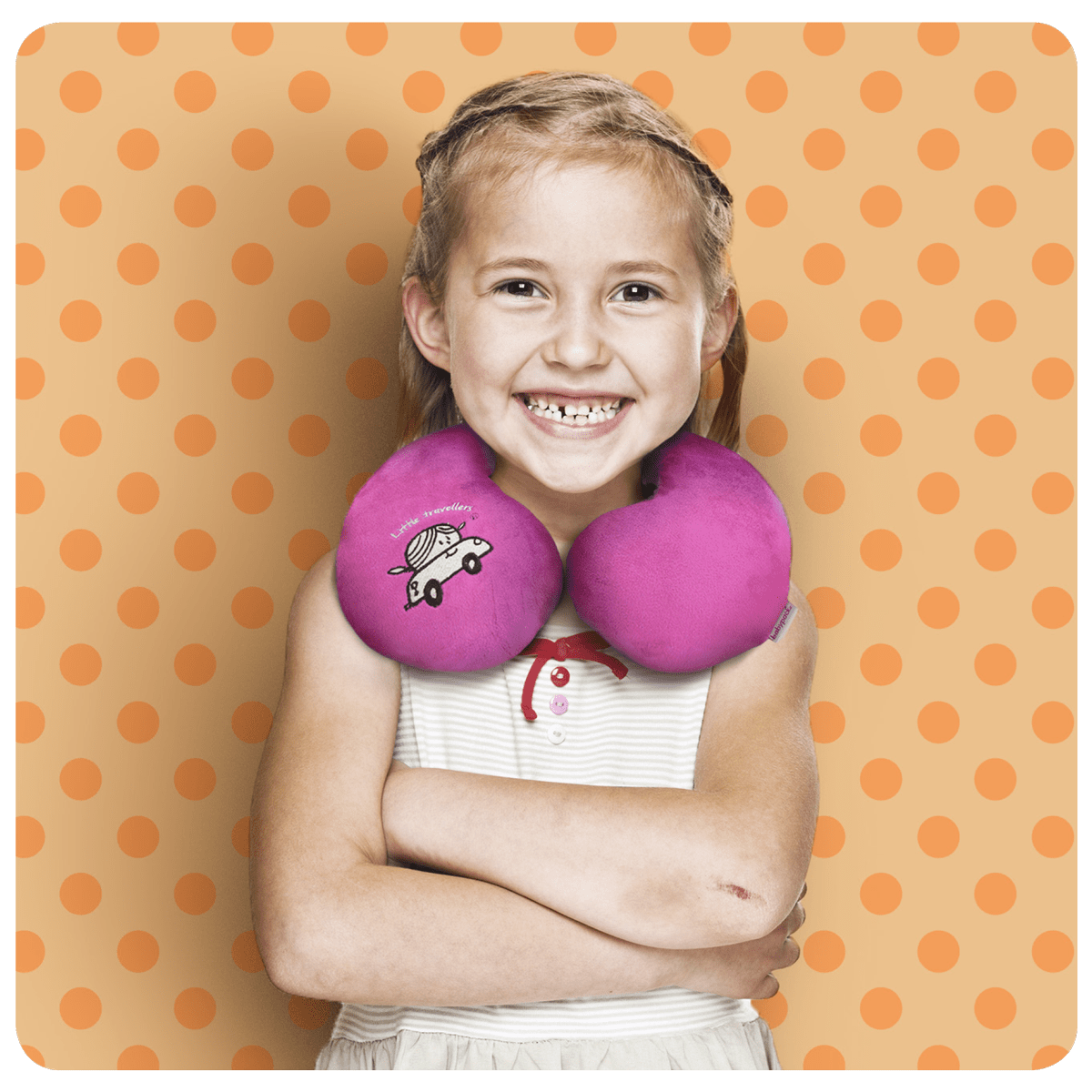 Toddler girl wearing travel neck support.